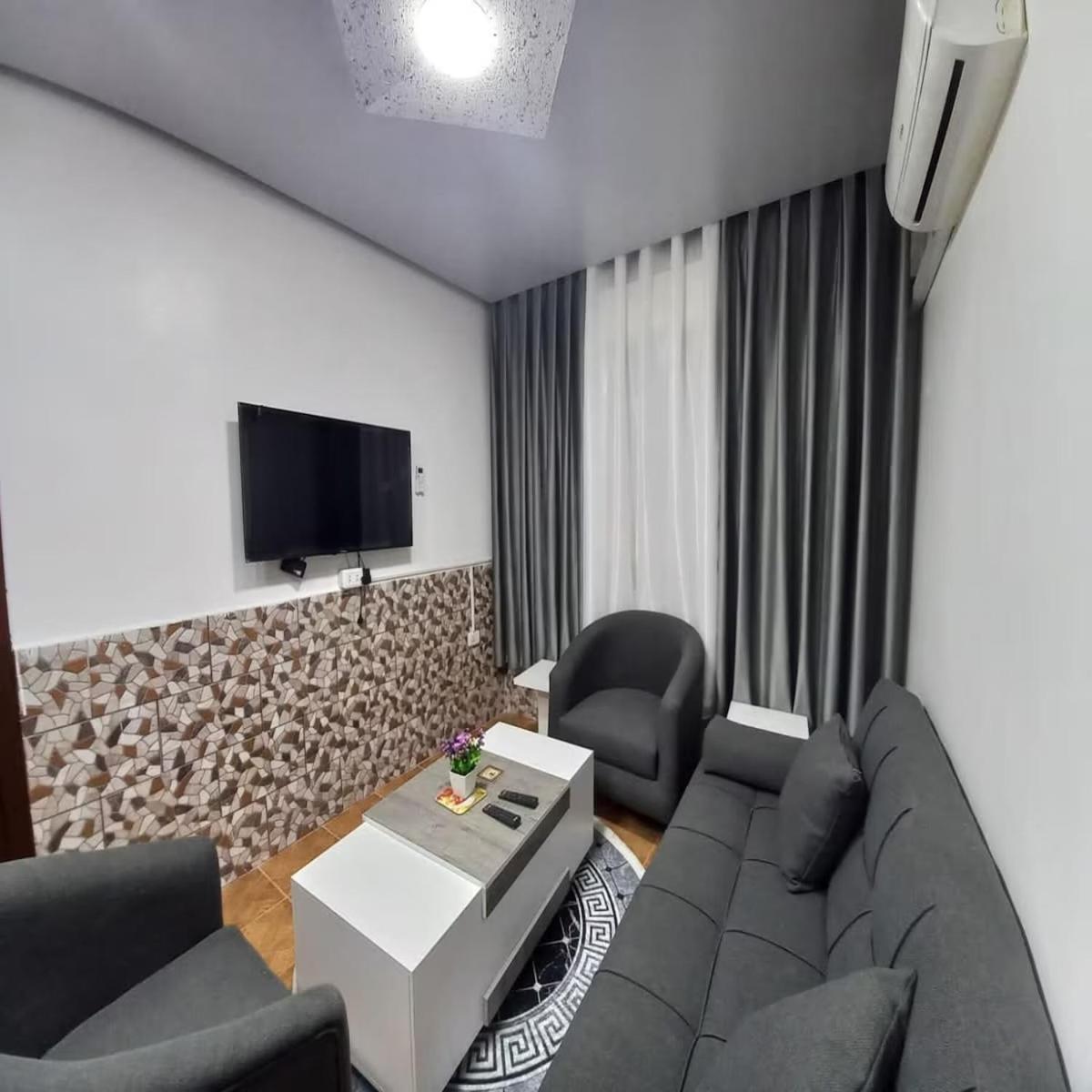 Al-Nujoom Hotel Suites Amman Exterior foto